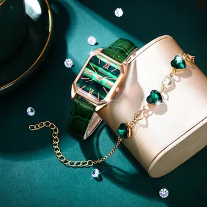 Detail of green malachite dial watch with gold case and matching heart bracelet