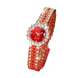 Elegant ladies quartz watch with gold metal strap, red dial and sparkling floral crystal bezel