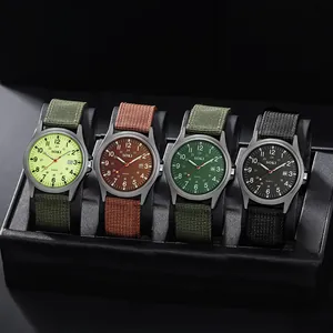 Detail showing four SOKI quartz watches with canvas straps and date display
