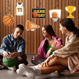 Basketball party decorations featuring GAME DAY swirls and orange sports themed hanging cards
