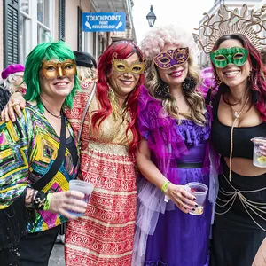 Colorful masquerade paper masks with glitter and diamond patterns for carnival parties