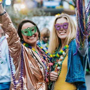 Carnival accessory set with colorful beaded necklaces and masquerade masks in festive party scene