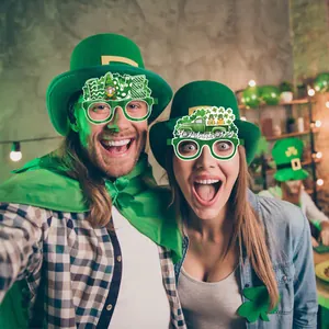 St. Patrick's Day party glasses with clover designs and gnome motifs worn by models