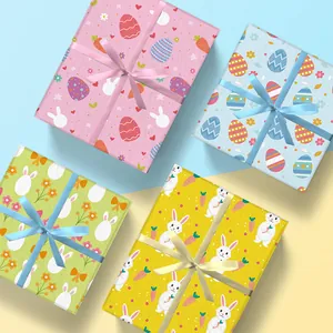 Ostergeschenkpapier-Set mit Hasen, bunten Eiern und Karottenmustern mit dekorativen Schleifen