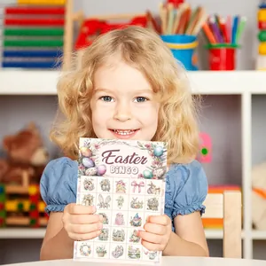 Easter Bingo game cards featuring watercolor eggs and bunnies held by a girl in party setting