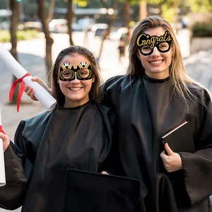 2025 graduation party eyewear props in black and gold worn by students in gowns