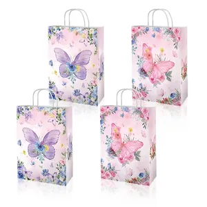 Set of 12 butterfly and floral paper gift bags with white handles for birthday parties