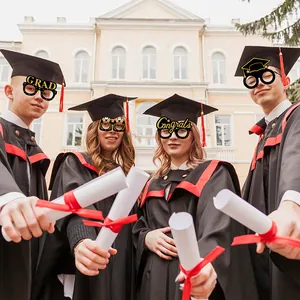 Group of graduates wearing black and gold 2025 graduation party paper glasses