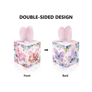Pink butterfly candy gift box with floral prints and heart-shaped handle on white cardstock