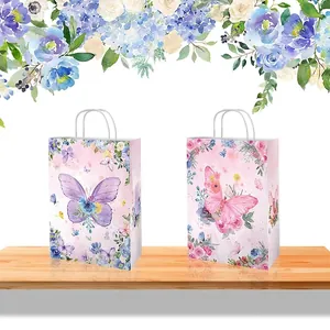 Pink and purple butterfly watercolor gift bags with white handles for party favors