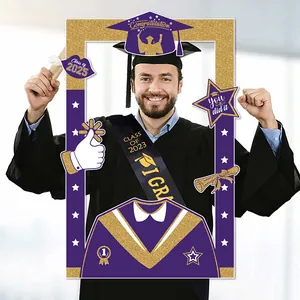 Macro detail of purple and gold graduation photo frame with glitter and 2025 cap motifs