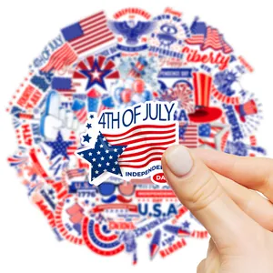 Hand holding USA flag Independence Day stickers for 4th of July party decorations
