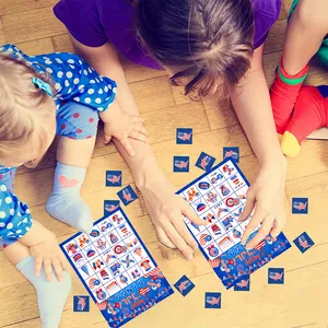 Family playing 4th of July Bingo game with patriotic American flag themed cards