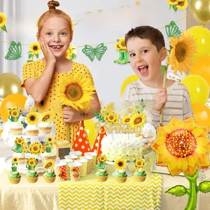 Décoration fête anniversaire tournesol avec bannière dorée et ballons jaunes