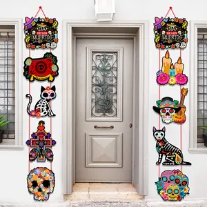 Dia de los Muertos colorful skeletons banner hanging on a white door for party decoration