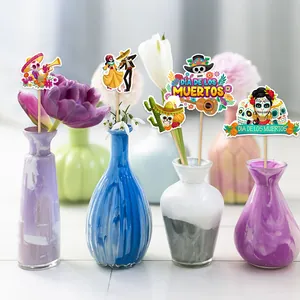 Day of the Dead decorative toppers set with colorful skulls and skeletons for party decor