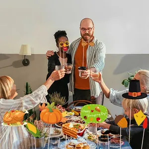 Thanksgiving photo booth props set with turkey, pumpkin and party hat for fall celebrations