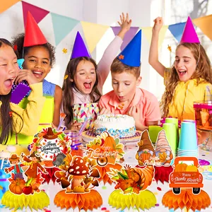 Thanksgiving honeycomb centerpieces with pumpkin and turkey designs for autumn party table decor