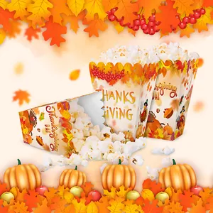 Thanksgiving treat boxes with turkey pumpkin prints and warm autumn party decorations