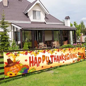Detailed macro view of large outdoor Thanksgiving banner with pumpkins and maple leaves