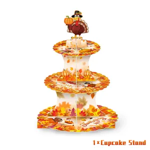 Three-tier Thanksgiving cupcake stand with turkey topper and festive pumpkin patterns