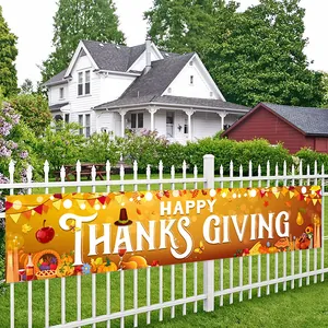 Outdoor Thanksgiving banner with Happy Thanksgiving text and pumpkins on white fence