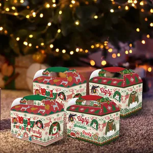 Four Christmas ugly sweater theme gift boxes with handles on a festive warm background