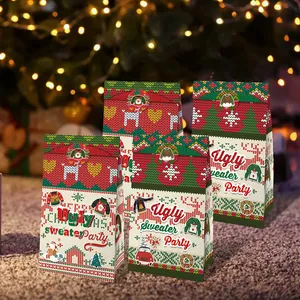 Detail of Christmas ugly sweater party gift bags with festive reindeer and snowflake prints