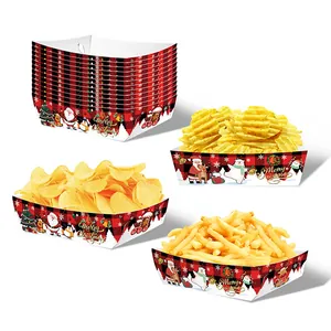 Macro shot of Buffalo Plaid Christmas snack trays with Santa and Reindeer illustrations