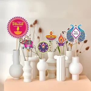 Diwali theme party decoration set with colorful peacock and elephant toppers in white vases