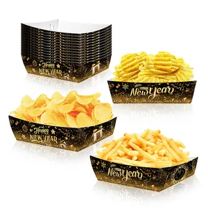 Macro view of Happy New Year paper food trays with festive fireworks and black gold design