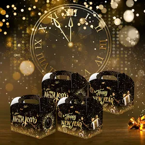 Set of four black and gold Happy New Year gift boxes with festive star and ribbon patterns