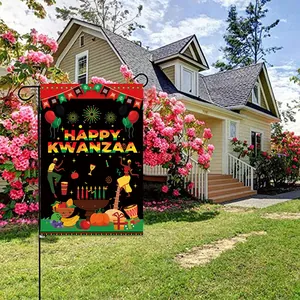 Outdoor Kwanzaa garden flag with Happy Kwanzaa text and African cultural motifs