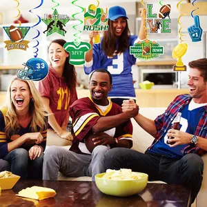 American football party decorations with hanging swirls and themed cardboard cutouts