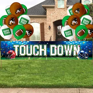 Touch Down football theme party set with grass background banner and colorful balloons