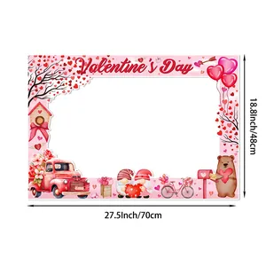 Pink Valentine's Day photo booth frame with cute heart motifs and festive characters