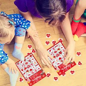 Valentine's Day Bingo game cards with red heart stickers for party activities
