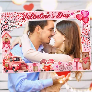 Pink Valentine's Day photo booth frame with heart illustrations for party decor