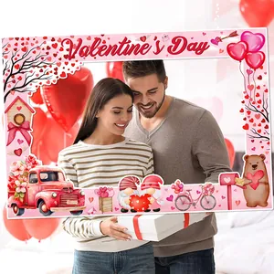 Pink Valentine's Day photo booth frame with heart balloons and romantic cartoon elements