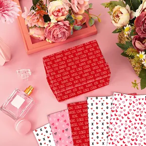 Valentine's Day wrapping paper with hearts and love motifs in pink and red tones