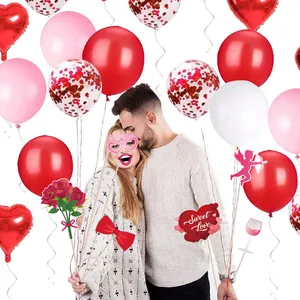 Valentine's Day party decoration set with pink heart balloons and sweet photo props