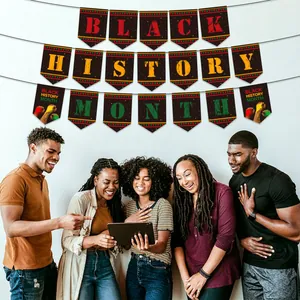 Black History Month party banner with red, yellow, and green flags for festive celebration