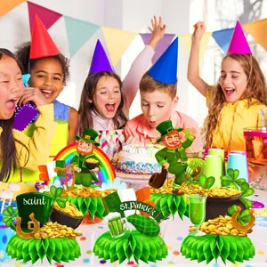 St. Patrick's Day party centerpieces featuring green honeycomb bases with festive icons