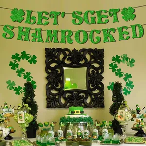 Glittery St. Patrick's Day banner featuring Let's Get Shamrocked text and clover motifs