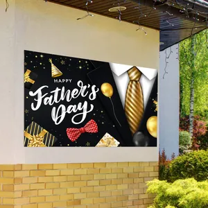 Detail of Happy Father's Day banner featuring tuxedo motifs and golden balloon graphics