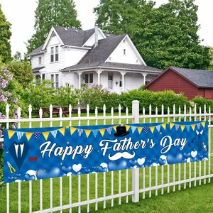 Outdoor Happy Father's Day banner with blue plaid design hanging on a white wooden fence