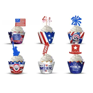 Close-up of Independence Day cupcake wrappers and toppers with red and blue glitter finish