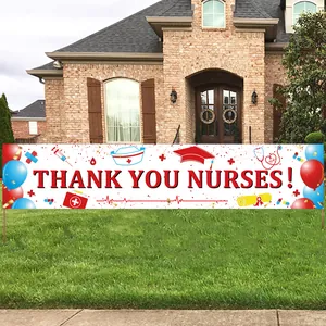 Close-up of Thank You Nurses banner with stethoscope and medical icons on outdoor lawn