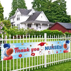 Outdoor banner for Nurses Day with Thank You text and medical tools icon on white fence