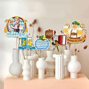 Oktoberfest party decoration kit with paper props in white vases for festive atmosphere